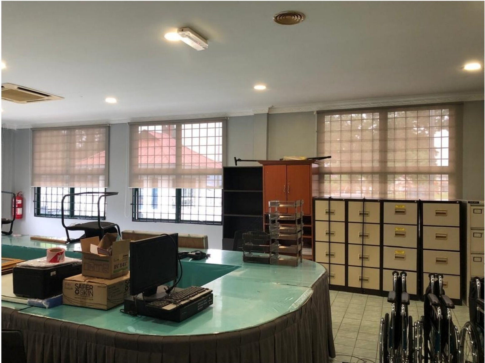 Roller blinds across a wide office wall in Shah Alam