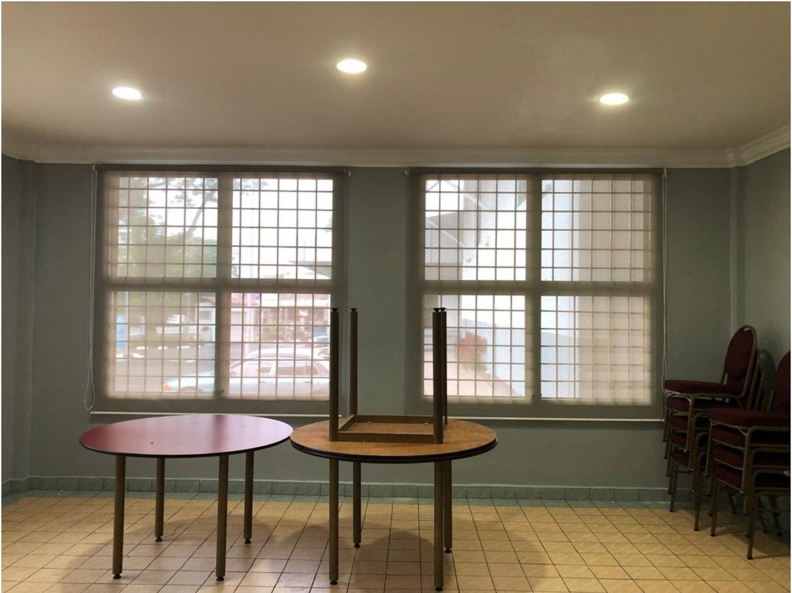 Sunscreen roller blinds installed in a Selangor function room